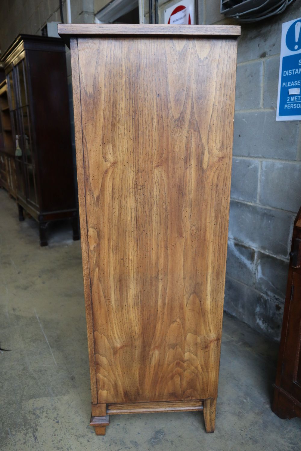 An American stencilled walnut six drawer tall chest, width 61cm, depth 46cm, height 132cm